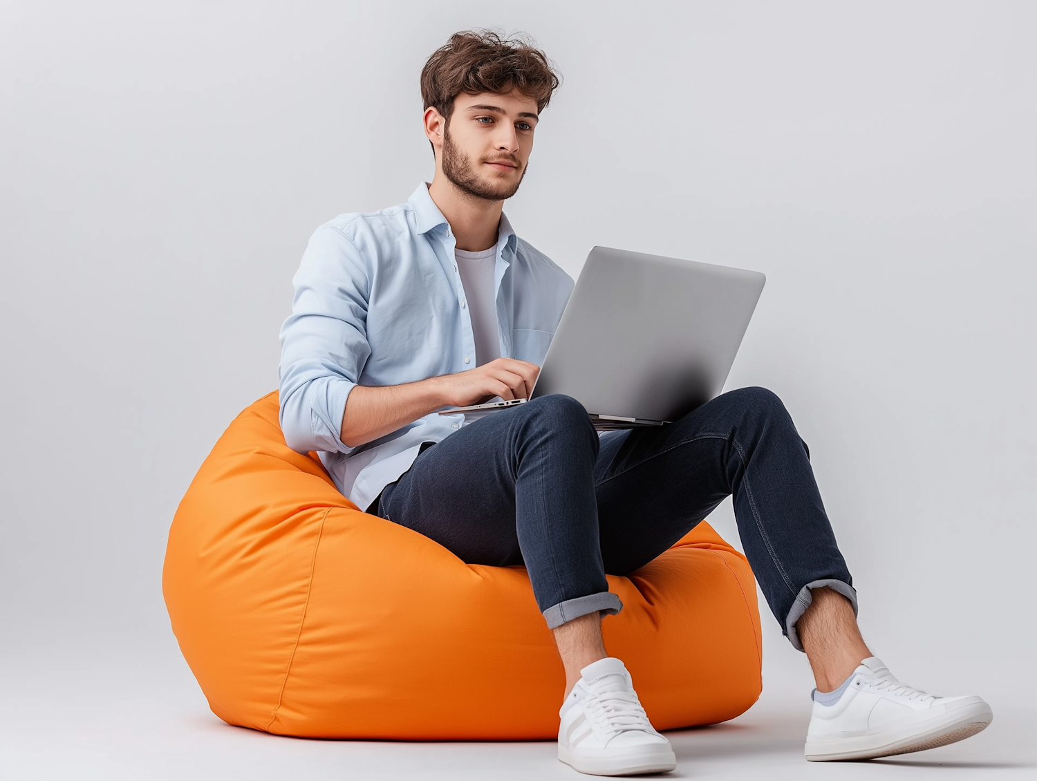 A person intently searching for local job opportunities on a laptop, illustrating the modern approach to finding employment.