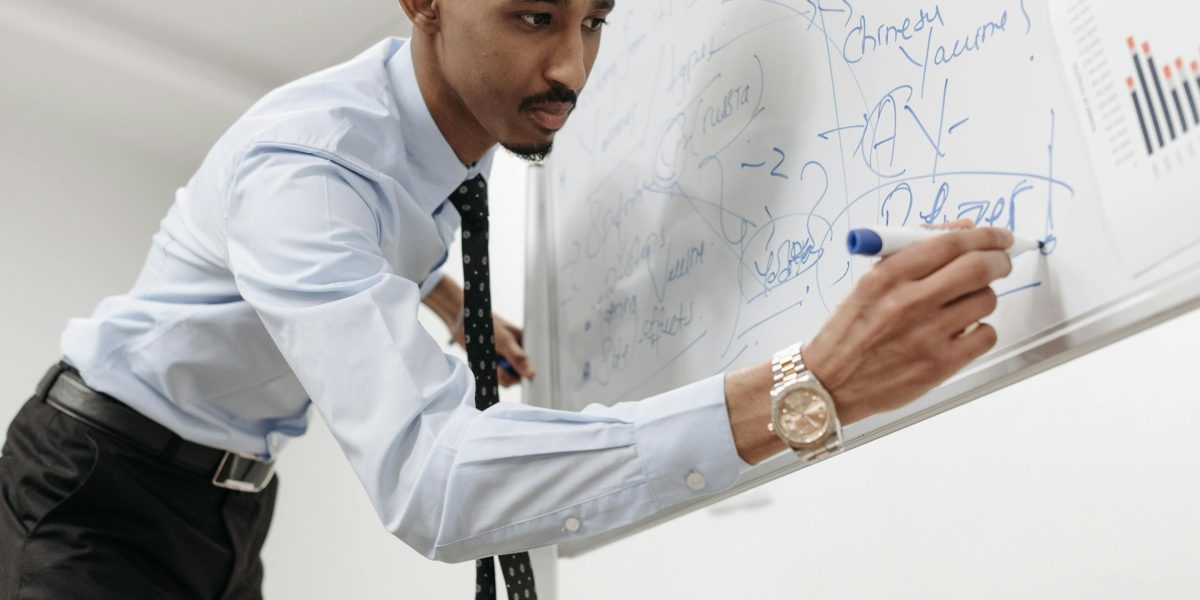 A person engaged in learning or skill development, emphasizing the importance of continuous growth alongside a strong resume.