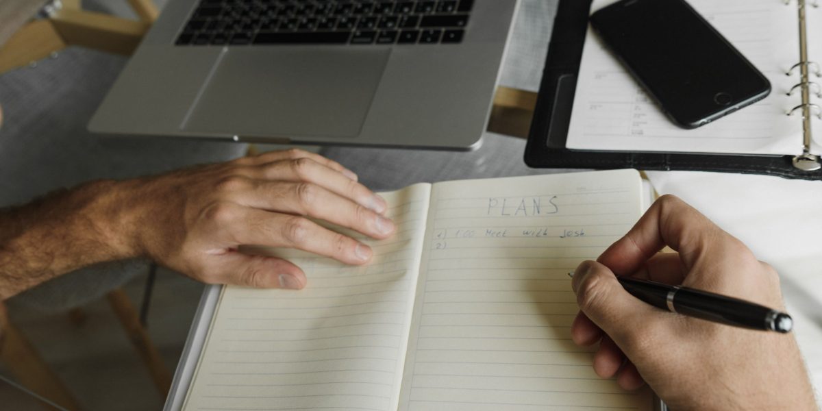A person thoughtfully planning their career trajectory, reflecting the ambition to join a rapidly growing company like Freshworks.