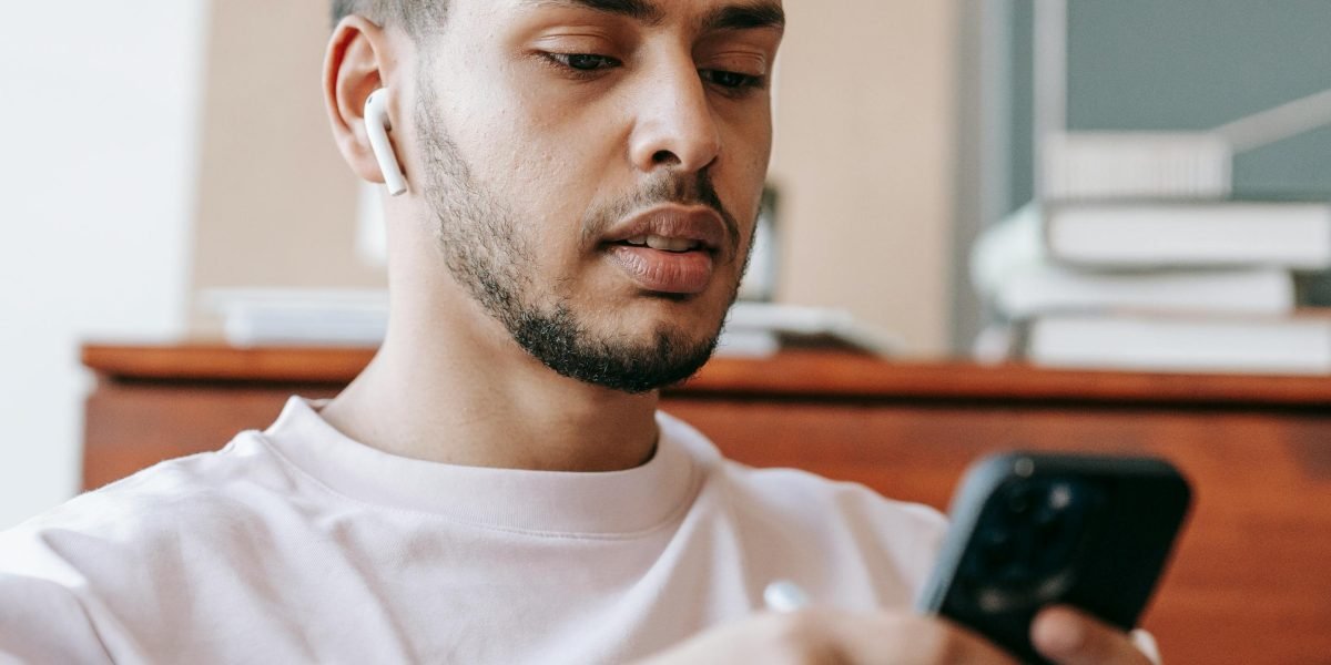A person intently reviewing job application details, symbolizing the careful approach needed for Freshworks' portal.