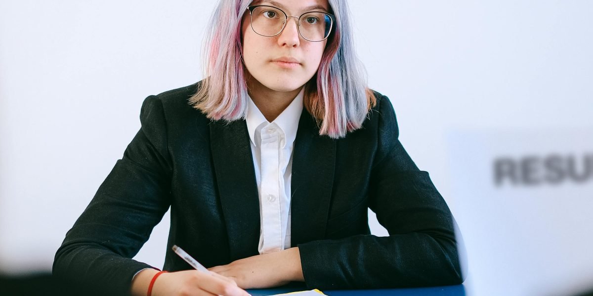 A person confidently engaging in a job interview, depicting the desired outcome of thorough preparation for Freshworks' process.